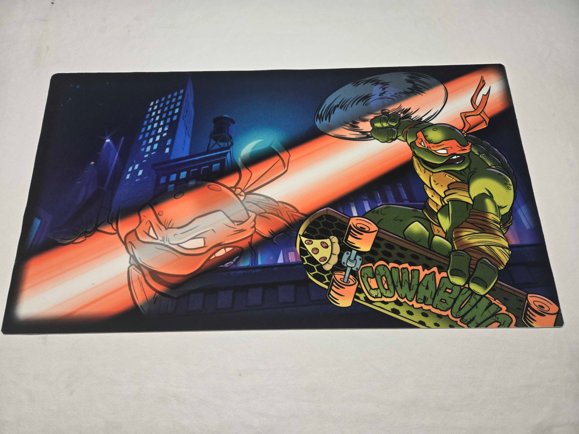 Michelangelo One-Player Playmat – Cowabunga Skater – Half-Shell Heroes Collection Cloth Playmat