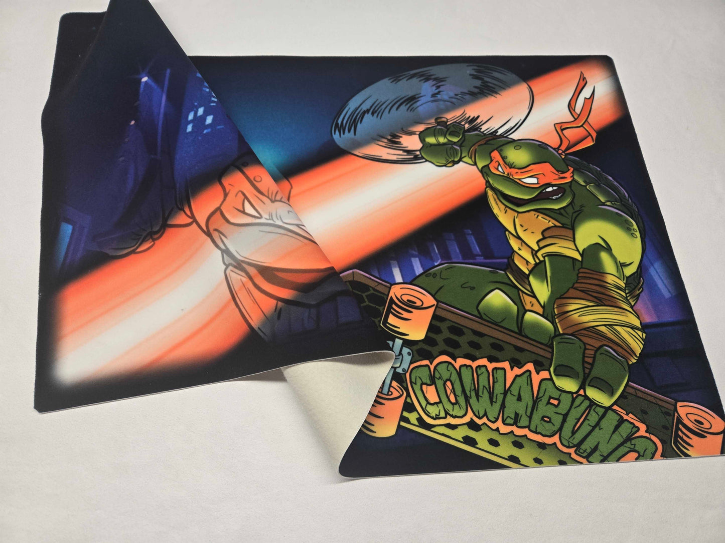 Michelangelo One-Player Playmat – Cowabunga Skater – Half-Shell Heroes Collection Cloth Playmat