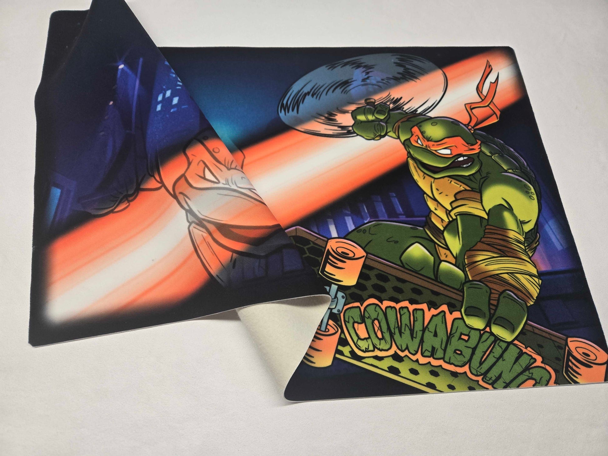 Michelangelo One-Player Playmat – Cowabunga Skater – Half-Shell Heroes Collection Cloth Playmat